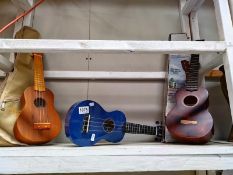 Three ukulele's, one a/f.