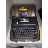 A vintage 'Good Companian 3' cased typewriter. COLLECT ONLY