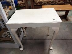 A white painted hall table