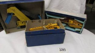 Three boxed Dinky toys, 972 and 571 cranes and 564 elevator loader.
