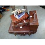 A set of 3 vintage suitcases, a wooden case and retro case wheels.