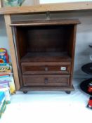 An oak two drawer unit. 51cm x 31cm x Height 64cm. COLLECT ONLY.