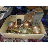 A selection of brass and copper items including planters, watering can etc