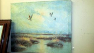An unframed oil on canvase depicting Ducks over a marsh, COLLECT ONLY.