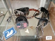 A good lot of cowboy/girl belts, spur, leather etc