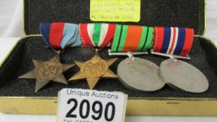 A British WW2 star, Italy Star, war medal and defence medal on bar.