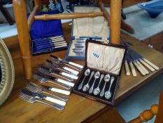 3 cased cutlery sets including fish knives and forks etc.