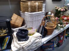 A good selection of wicker baskets and laundry items and iron etc.
