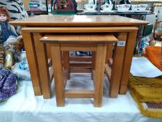 An oak nest of three tables. Large table 67cm x 53cm x 46cm. COLLECT ONLY.