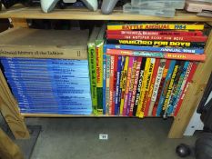 A shelf of 70's 80's and 90's annuals and a set of Disney "World of Knowledge"