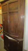 A Victorian oak corner cupboard with shaped shelves, 107 x 56 x 210 cm tall. COLLECT ONLY.