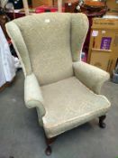 A classic Parker Knoll wing back chair
