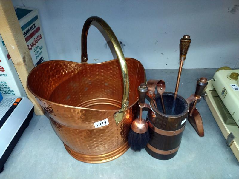 A hammered copper & brass handled coal scuttle & companion set COLLECT ONLY