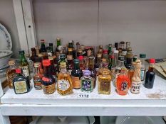 A quantity of vintage alcohol miniatures COLLECT ONLY