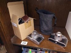 2 Italian cameras from 1950's and a box of camera accessories including filter and lens etc