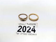 A 9ct gold half eternity ring, size O and another 9ct gold ring, size K. 3.9 grams.