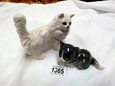 A Goebel kitten and a Beswick cat (rough edge to glaze on left ear)