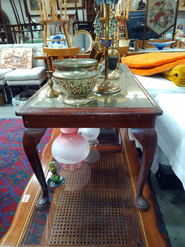 A dark wood stained coffee table with glazed leather top. 95cm 46cm x Height 43cm. COLLECT ONLY. - Image 2 of 2