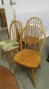 Three Ercol style dining chairs. COLLECT ONLY.