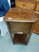 A 1930's oak sewing/work box with draw. 38cm x 38cm x height 66cm.