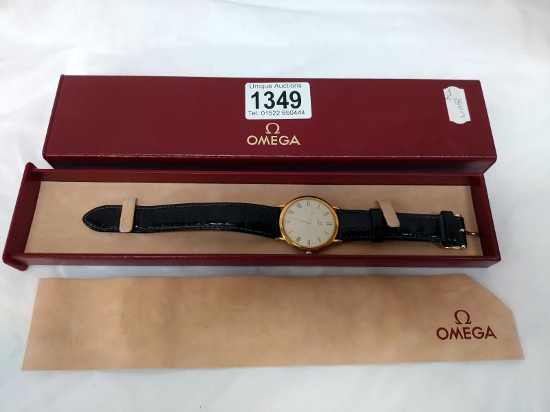 A boxed gents Omega De Ville quartz watch with leather strap