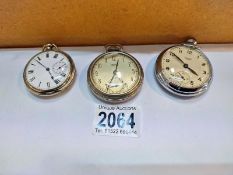 Three old pocket watches.