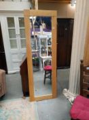 A long oak frame mirror. 60cm x 180cm. COLLECT ONLY.