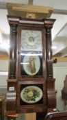 An early 20th century wall clock with painted panels. COLLECT ONLY.