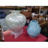 2 large vases. One blue, flower decoration and the other with small mirror tiles