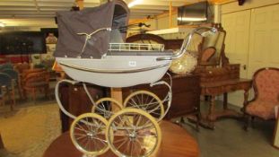 A Silver Cross dolls pram, COLLECT ONLY.