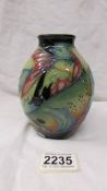 A Moorcroft fish design trial piece vase, dated 23/7/07.