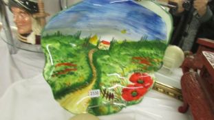 An Italian hand painted ceramic dish.