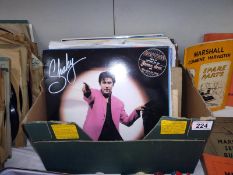 A quantity of 70's - 80's LP's including Blondie and Kylie, etc