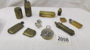 A collection of Trench art lighters etc.,