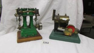 A Stuart Turner twin cylinder model and a live steam stationary engine.