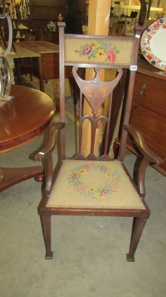 An early 20th-century carver chair with art nouveau inlay and tapestry seat. COLLECT ONLY.