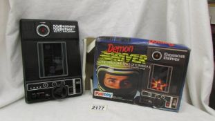 A boxed Palitoy Demon Driver electronic game.