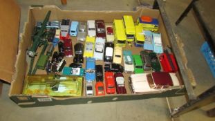A large lot of unboxed Norev, Delprado diecast cars including Dinky 625 anti tank gun etc.,