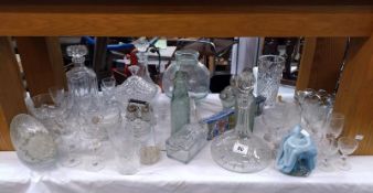 A good lot of glassware including a ships decanter & an unusual goldfish bowl