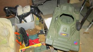 A box of Action man items including tank and horse.