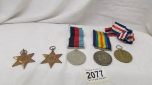 Two WW1 medals for 222357 GNR H Hardy RA, A WW2 medal and 2 WW2 stars.