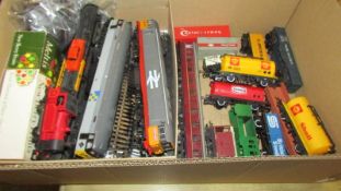 A box of Hornby/Triang 00 gauge locomotives, rolling stock, track etc.,