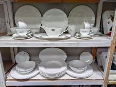 A Royal Doulton Gordon Ramsey dinner service. (2 shelves)