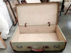A good leatherette cornered travel suitcase