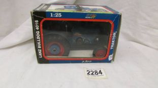 A boxed Kovap 1/25 scale tin plate clockwork Lanz Bulldog 4016 tractor.