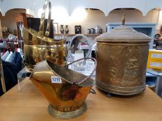 An arts and crafts copper and brass funnel coal scuttle and 1 other plus a ship relief hammered coal