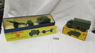 A boxed Dinky 697 25 pounder field gun set and a 621 one ton army wagon.
