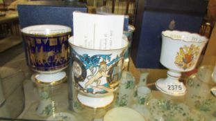 Five Coalport and Two Royal Worcester commemorative goblets.