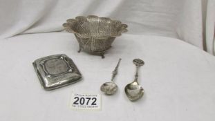 A silver cigarette case,silver 1977 jubilee spoon, a silver spoon a white metal filigree bowl.