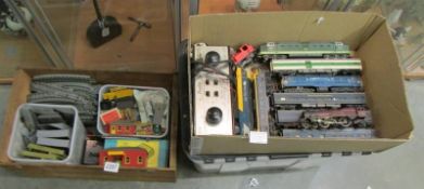 Two boxes of 00/H0 railway engines, rolling stock, track etc.,